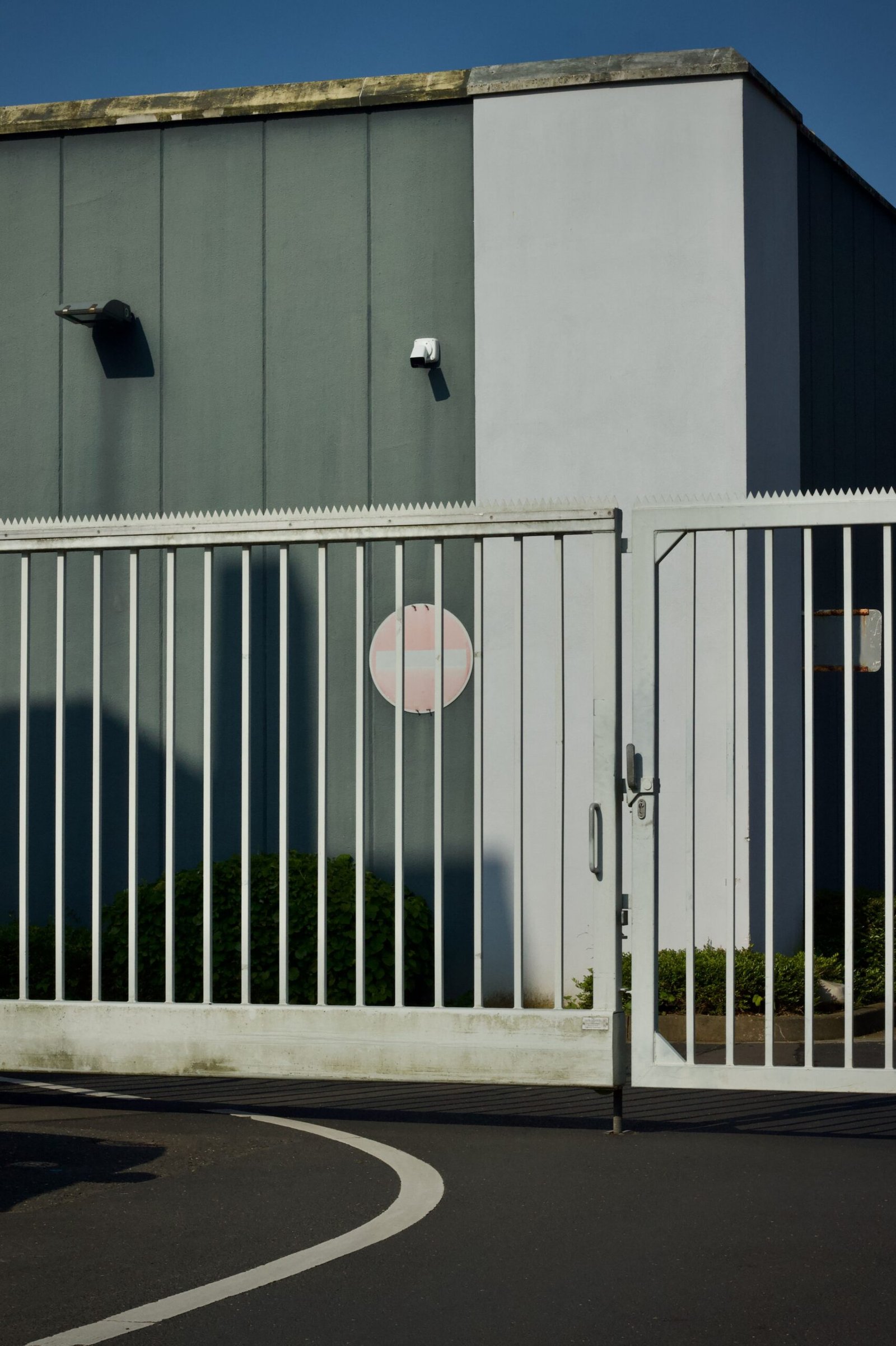 Secured industrial building with a large metal gate